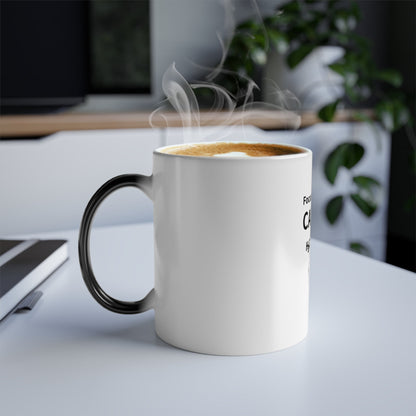 Steaming coffee mug on a desk with a blurred office background